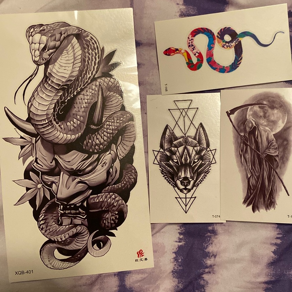 REALISTIC fake tattoos a set of 4. One big tattoo 3 medium.